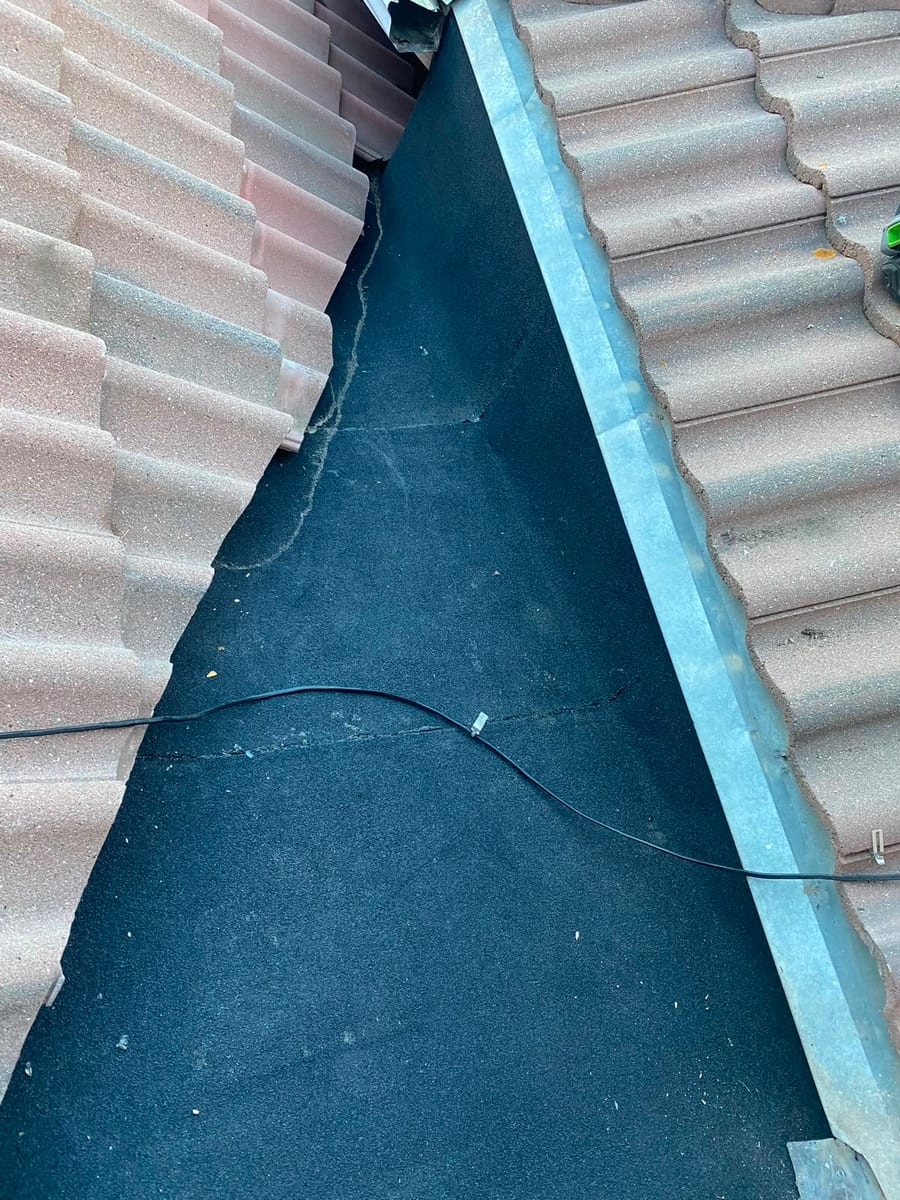SBS tie-in across a low-slope area within a tile roof