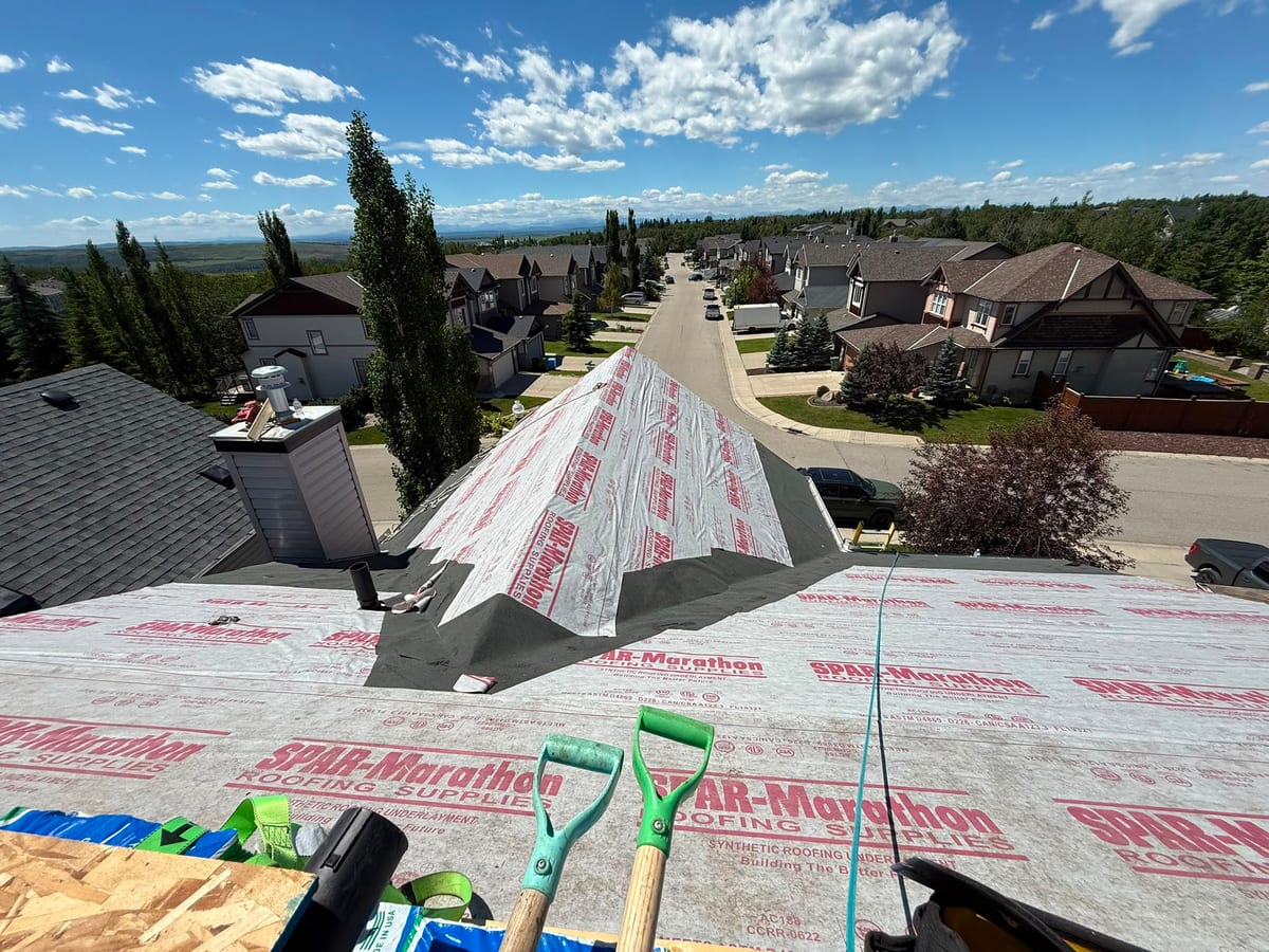Ice and water barrier run into the valleys under new underlayment